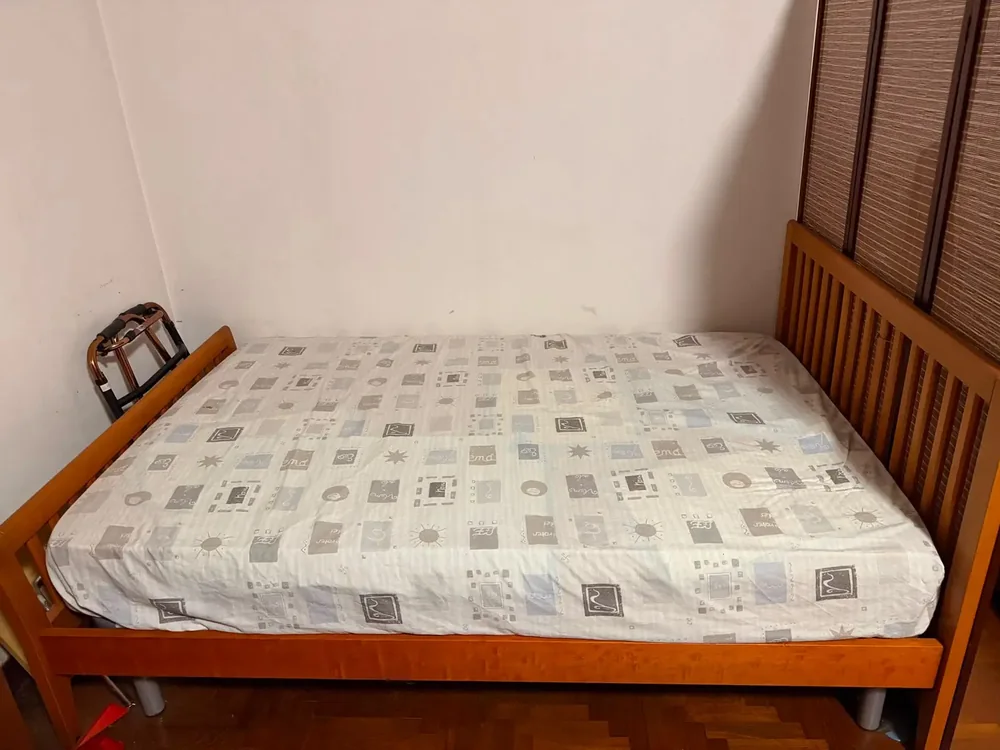 Bed and mattress from a Smiley Express disposal job