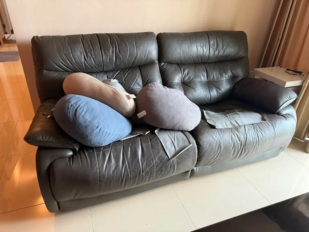 Unwanted sofa from a Smiley Express disposal job